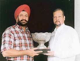 G.S. Kochher and Darvesh with the trophy they shared in the Forest Hill Monsoon Golf Tounament