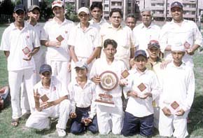 The Lal Bahadur Shastri Club team, who won the Madhu Vihar Under-15 Cricket Tournament, displaying the trophy