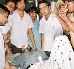 President of the Panjab University Students Council Malwinder Singh Kang being taken for a CT scan in the PGI after he was attacked by a group of students at Panjab University campus 