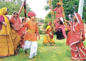 Traditional dancers celebrating Teej festival at Appu Ghar in the Capital