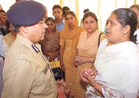Delhi Police Commissioner R.S. Gupta during a function to distribute appointment letters to the widows of police personnel
