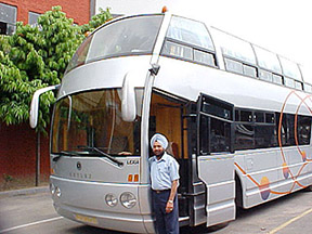 Mr Daljit Singh shows the double-decker luxury bus manufactured by his unit