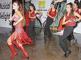Rakhi Sawant performs during an Airtel function at the Sector 17 Piazza, Chandigarh