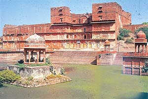 A large tank encircled by a temple gives a picturesque view of Muchkund