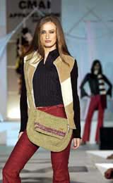 A model sashays down the ramp at the Clothing Manufacturers Association of India fashion show 