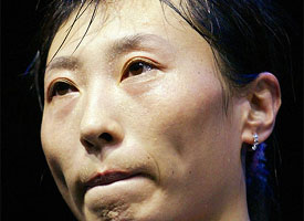 Zhang Ning of China cries in joy after beating compatriot Gong Ruina 