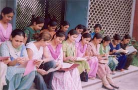 Students of the College of Home Science fill their registration cards for the new academic session at Punjab Agriculture University