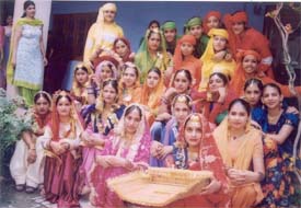 Students of SDP College for Women wait for the Miss Teej contest 