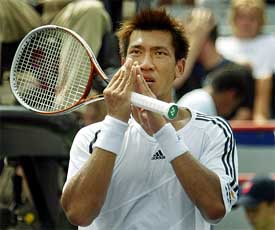 Paradorn Srichaphan of Thailand bows to the crowd following his win against Spain's Alberto Martin