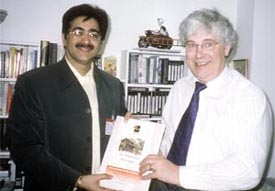 AAFT Director Sandeep Marwah presenting life membership of the International Film and Television Club to Mr Roger Crittenden, Director of NTFS