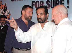 Michael Hooper, CEO-CGF, Mr Suresh Kalmadi, president, Indian Olympic association, and Mr Richard Mc Colgan-MBF at Press conference in New Delhi