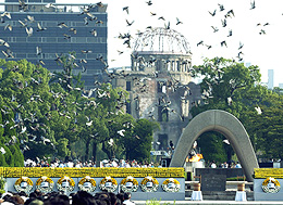Doves are released into the sky to highlight the 58th anniversary of the worlds first atomic bombing