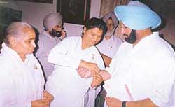 A Brahmakumari sister ties a rakhi on the Chief Minister, Capt Amarinder Singhs wrist