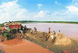 Illegal quarrying on the bed of the Ghaggar has caused rapid soil erosion and loss of cultivable land at Rampur village