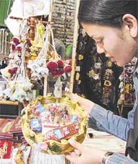 Rakhis in the form of Spiderman, Batman and other cartoon characters on sale
