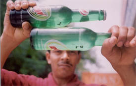 Flies seen in two bottles of Mountain Dew purchased by a shopkeeper