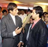 Amitabh Bachchan talks to Hrithik Roshan at the launch of Fun Republic, an entertainment centre
