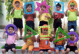 Children of Lovely Lotus display rakhis of various shapes prepared at the school