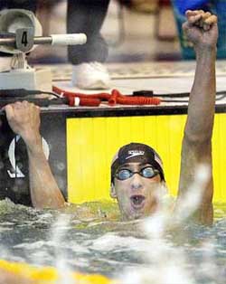 US swimmer Michael Phelps reacts after winning the 200m individual medley event at the US National Swimming championships 