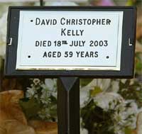 A temporary nameplate is placed on the grave of weapons' expert David Kelly