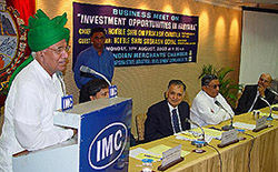 Haryana Chief Minister Om Prakash Chautala addresses a business meeting 