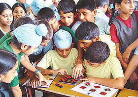 Students of St Stephens School, Sector 45, Chandigarh, play The Kaleidoscope Classic, a mind game, which was introduced in the school on Monday. 
