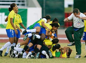 The Brazilian women's soccer team celebrate their 2-1 victory over Argentina in the semifinal of the XIV Pan American Games