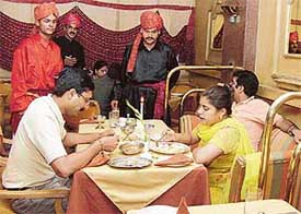 A family enjoys the special treat offered by Hotel Maya Palace