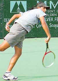 Yajiani Baluja of Chandigarh serves on the opening day of the AITA Junior Talent Series Tennis Tournament 
