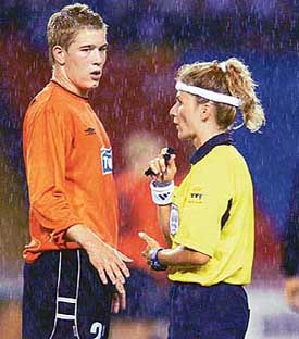 Swiss referee Nicole Petignat talks to Arnar Ulfarsson of Fylkir during the UEFA Cup 
