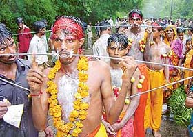 A procession a of Mata Sheetla devotees passes through Sector 26, Chandigarh
