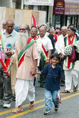 Members of the Senior Citizen Association of Hudson County at an Independence Day procession to mark Indias 57th Independence Day in New Jersey