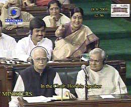 Prime Minister Atal Bihari Vajpayee and Deputy Prime Minister L.K. Advani listen to the speech of Sonia Gandhi, while Parliamentary Affairs Minister Sushma Swaraj reacts during the no-confidence motion in Parliament on Monday. 