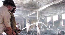 The gutted remains of the first floor of the paint and chemicals factory located in Sector 8