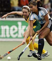 Susannah Harris of Australia fights for the ball with Maria Cecilia Rognoni of Argentina 