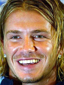 Real Madrids David Beckham smiles during a press conference at Maldon, England