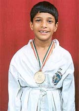 Jatin Sachdeva who won a gold medal in the Group Tulls Boys category of Taekwon-Do competition