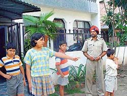 Paras (left) and Anmol, children of Gurinder Kaur, who was shot dead by her husband in SAS Nagar on Thursday.