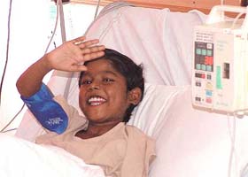 Arti, the first child in India to receive liver transplant from a cadaveric donor, is all smiles at the ICU of Ganga Ram Hospital in the Capital