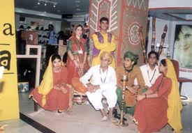 A folk dance group at Shoppers Stop