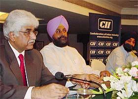 Mr Rakesh Bharti Mittal, Deputy Chairman, CII Northern Region, and PWD Minister, Mr Partap Singh Bajwa, at an interaction in Ludhiana