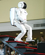 Honda Motor Cos robot negotiates a stairway at a public appearance in Manila on Saturday.