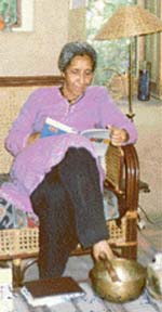 Kishwar Shirali relaxes in her home