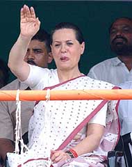 Congress President Sonia Gandhi waves to the crowd after inaugurating the Rajiv Gandhi Stadium at Bawana in Delhi on Saturday. 