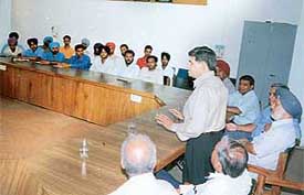 The director, Small Industries Service Institute, delivers a talk at a training programme for rural artisans at Punjab Agricultural University