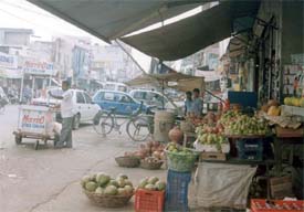 The entire length of pavement is under occupation of vendors in the busy Ghumar Mandi Market