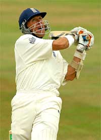 Englands Alec Stewart reacts as he hits out and is caught by South Africas Andrew Hall off Dewald Pretorius 