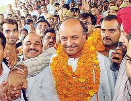 Dr Parveen Togadia, International General Secretary of the Vishva Hindu Parishad, with his supporters 