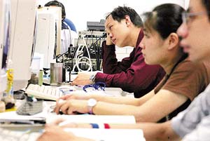 Students take a computer lesson at a Taiwan job-training centre