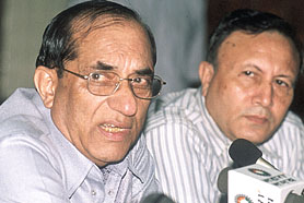 President of All India Council of Sports Vijay Kumar Malhotra addressing a press conference in the Capital on Sunday. Director General Sports Authority of India Shekhar Dutt looks on. 